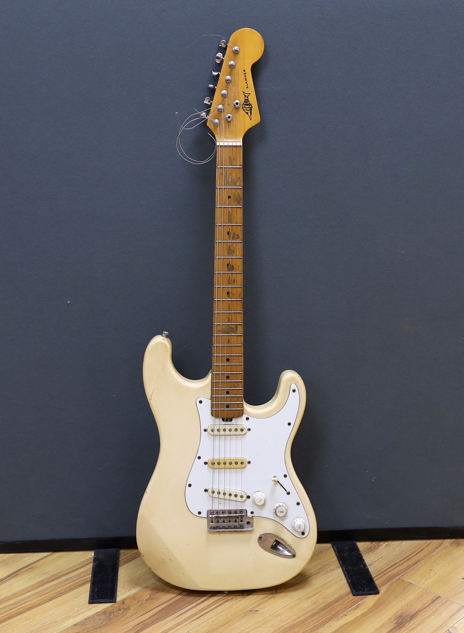 A Marlin Slammer electric guitar with maple neck, together with a flight case